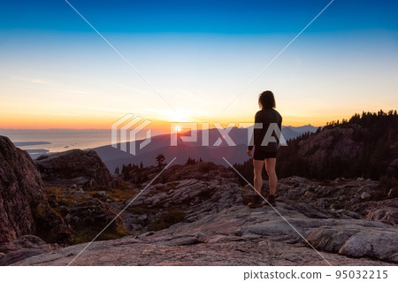 Adventurous Woman Hiker on top of Canadian Mountain Landscape. 95032215