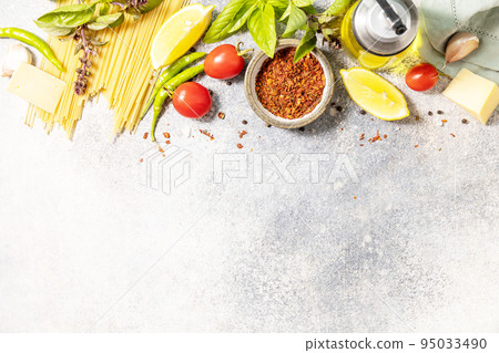Italian food background. Cooking traditional italian pasta. Ingredients on a stone tabletop. View from above. Copy space. Italian food background. Cooking traditional italian pasta. Ingredients on a stone tabletop. View from above. Copy space. 95033490