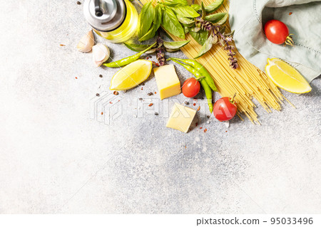 Italian food background. Cooking traditional italian pasta. Ingredients on a stone tabletop. View from above. Copy space. Italian food background. Cooking traditional italian pasta. Ingredients on a stone tabletop. View from above. Copy space. 95033496