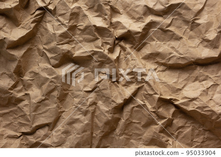 Crumpled parcel paper background texture copy space Crumpled parcel paper background texture copy space 95033904