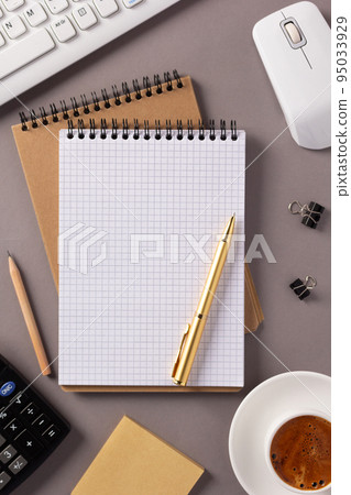 Manager or student workplace and notebook with stationary supplies at table. Study concept idea Manager or student workplace and notebook with stationary supplies at table. Study concept idea 95033929