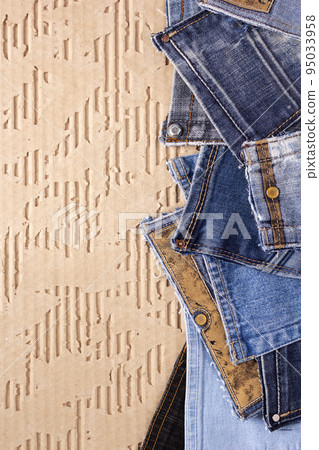 Blue jeans pocket denim on paper background texture. Jeans fabric material Blue jeans pocket denim on paper background texture. Jeans fabric material 95033958