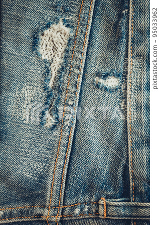 Torn jeans pocket denim background texture. Blue jeans fabric as material 95033962