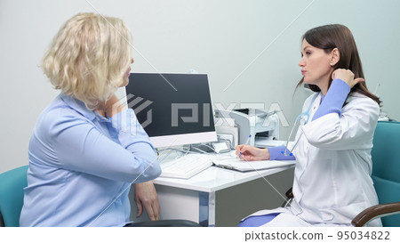 Woman complains of migraine and neck pain before scanning 95034822