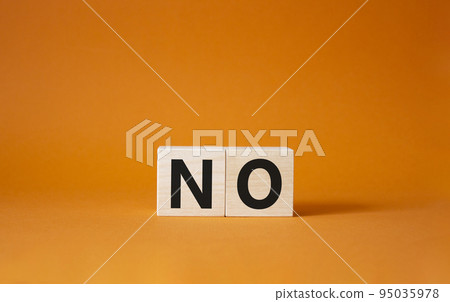 No symbol. Concept words No on wooden blocks. Beautiful orange background. Business and No concept. Copy space. No symbol. Concept words No on wooden blocks. Beautiful orange background. Business and No concept. Copy space. 95035978