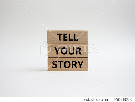 Tell your story symbol. Wooden blocks with words Tell your story. Beautiful white background. Business and Tell your story concept. Copy space. 95036098