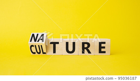 Nature and Culture symbol. Turned wooden cubes with words Culture and Nature. Beautiful yellow background. Business concept. Copy space. 95036187