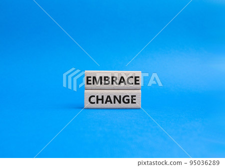 Embrace change symbol. Concept word Embrace change on wooden blocks. Beautiful blue background. Business and Embrace change concept. Copy space Embrace change symbol. Concept word Embrace change on wooden blocks. Beautiful blue background. Business and Embrace change concept. Copy space 95036289