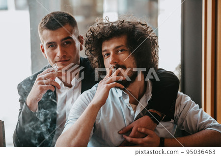 Portrait of multiethnic diverse gay LGBT romantic male couple embracing and showing their love 95036463