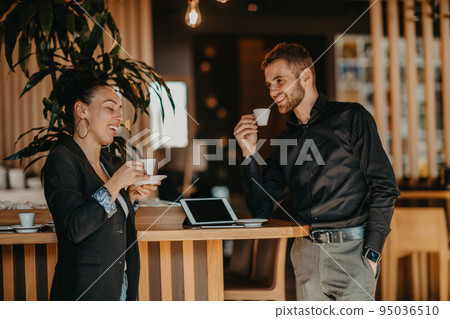 Businessman and businesswoman use modern devices, laptop, tablet and smartphone and arrange new projects for the job.  95036510