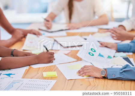 Project management, budget and schedule planning with business people hands in meeting closeup and paper work or document analysis. Marketing team or company looking at graphs, charts and seo data Project management, budget and schedule planning with business people hands in meeting closeup and paper work or document analysis. Marketing team or company looking at graphs, charts and seo data 95038311