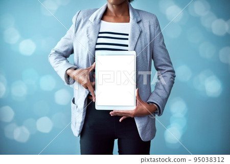 Blank screen and copy space on a tablet with a woman showing a digital device. Closeup of female hands holding tech product. Person posing with and showing or promoting technology Blank screen and copy space on a tablet with a woman showing a digital device. Closeup of female hands holding tech product. Person posing with and showing or promoting technology 95038312