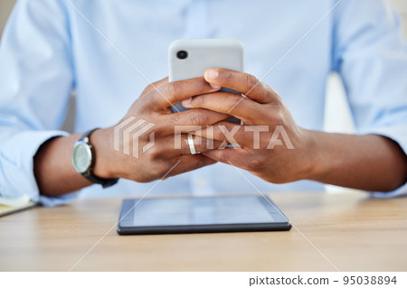 Phone, communication and business man working and texting with 5g network, social media and chatting on messaging app on smartphone at desk. Closeup hands of professional worker checking email 95038894