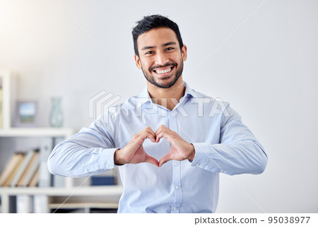 Asian businessman, heart sign and hand gesture emoji for support, trust and passion for success. Portrait of smile, happy or motivation worker for charity, community love or help for people in office 95038977