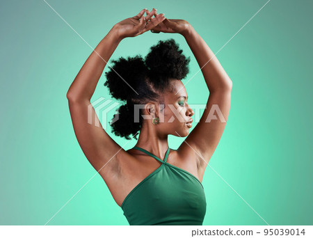 Black woman, fashion and dance model pose of a person from Jamaica confident. Beauty and female empowerment of a salsa dancing and posing dancer with confidence in a studio with a green background Black woman, fashion and dance model pose of a person from Jamaica confident. Beauty and female empowerment of a salsa dancing and posing dancer with confidence in a studio with a green background 95039014
