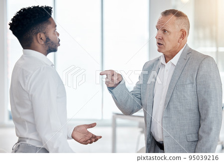 Angry businessman executive and finger pointing for conflict mistake or KPI fail. Corporate boss, ceo or manager unhappy, frustrated or stress fight with employee for bad job or career review results 95039216