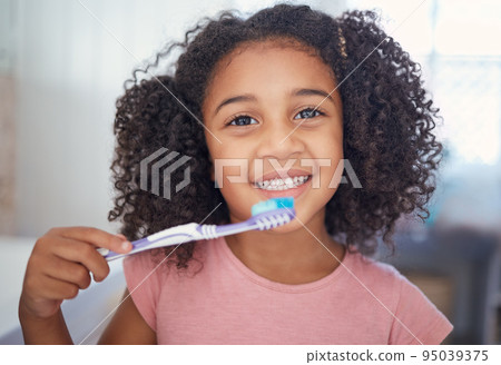 Young girl kids, portrait and brushing teeth, dental healthcare and bathroom toothbrush in Brazil home. Happy, smile and black child face cleaning mouth, healthy wellness development and fresh breath 95039375