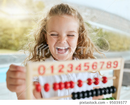 Learning math, abacus smile and girl studying with tool for help, easy education at school and excited in classroom at kindergarten. Happy, funny and comic student counting with equipment in home Learning math, abacus smile and girl studying with tool for help, easy education at school and excited in classroom at kindergarten. Happy, funny and comic student counting with equipment in home 95039377
