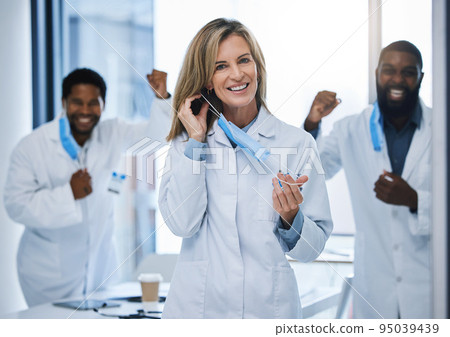 Doctors celebrate removing covid face mask at end of pandemic, celebration of virus done and success in medical hospital. Face portrait of healthcare workers happy after surgery and coronavirus 95039439