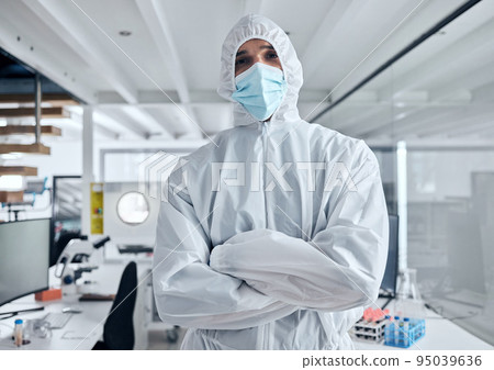 Covid, safety and portrait of man in hazmat suit to protect against covid 19 pandemic, risk or corona virus. Ppe, face mask and medical healthcare worker, doctor or scientist in science laboratory Covid, safety and portrait of man in hazmat suit to protect against covid 19 pandemic, risk or corona virus. Ppe, face mask and medical healthcare worker, doctor or scientist in science laboratory 95039636