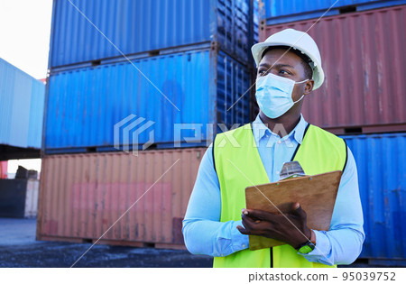 Logistics, shipping and businessman in covid with clipboard in cargo container yard. Construction worker with mask doing stock inspection for transportation, delivery and import and export industry 95039752