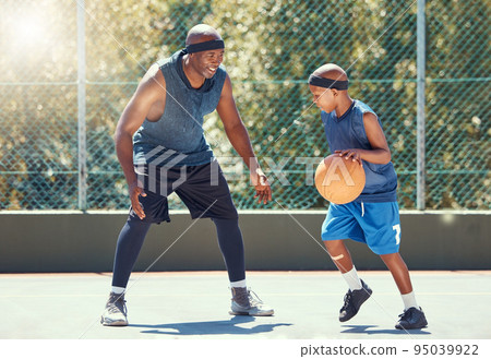 Sport, family and learning basketball with a dad and son training on a court outside for leisure fitness and fun. Black man and kid doing exercise and workout playing a game for health and training 95039922