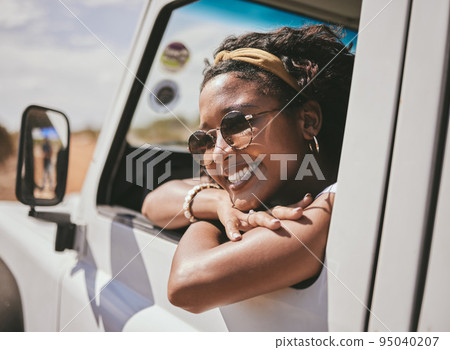 Happy black woman, travel and summer on road trip with smile for vacation or break in the outdoors. African American female smiling in happiness for holiday getaway, adventure and traveling in Mexico Happy black woman, travel and summer on road trip with smile for vacation or break in the outdoors. African American female smiling in happiness for holiday getaway, adventure and traveling in Mexico 95040207