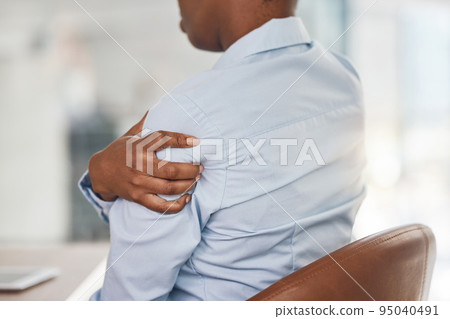 Arm pain, injury and business person with burnout while working in office, medical emergency at work and muscle ache. Corporate African employee with painful shoulder accident in the workplace 95040491