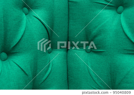 Green leather upholstery sofa corner pattern button design furniture style decor texture background decoration vintage material Green leather upholstery sofa corner pattern button design furniture style decor texture background decoration vintage material 95040809