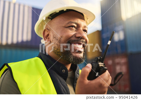 Logistics, supply chain and radio with a man delivery professional working on a dock or container yard. Communication, shipping and cargo with a male courier at work in distribution, stock or export Logistics, supply chain and radio with a man delivery professional working on a dock or container yard. Communication, shipping and cargo with a male courier at work in distribution, stock or export 95041426