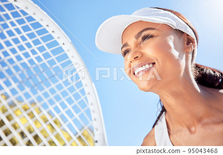 Sport, fitness and portrait of tennis woman with racket, smile or motivation with training, exercise or health workout. Happy, mindset or wellness coach smiling with energy or thinking of sports goal 95043468