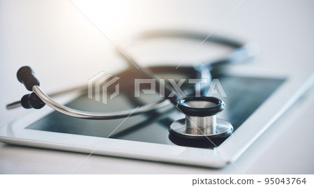 Stethoscope, digital tablet and telehealth app on hospital, medical wellness and healthcare table. Zoom on communication internet technology, medicine equipment support and insurance consulting help Stethoscope, digital tablet and telehealth app on hospital, medical wellness and healthcare table. Zoom on communication internet technology, medicine equipment support and insurance consulting help 95043764