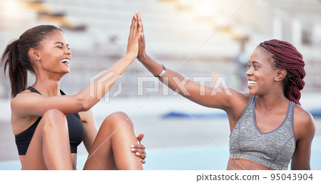 Support, high five and black woman running team winner at athlete practice in stadium. Congratulations, motivation and success at workout training with happy and joyful fitness friends. Support, high five and black woman running team winner at athlete practice in stadium. Congratulations, motivation and success at workout training with happy and joyful fitness friends. 95043904