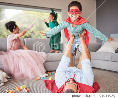 Happy parents and children in costume playing, bonding and having fun together in living room. Happiness, excited and family enjoying fantasy dress up for halloween entertainment with kids at home. 95044029