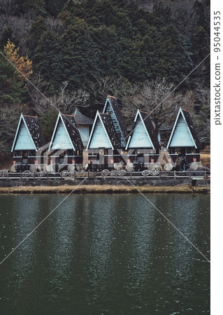 Dutch building reflected in the lake #3 95044535