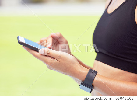 Fitness woman, phone app and hands of sports outside for exercise, training and workout for health and fitness. Closeup of active female athlete runner tracking progress for cardio steps and wellness 95045103