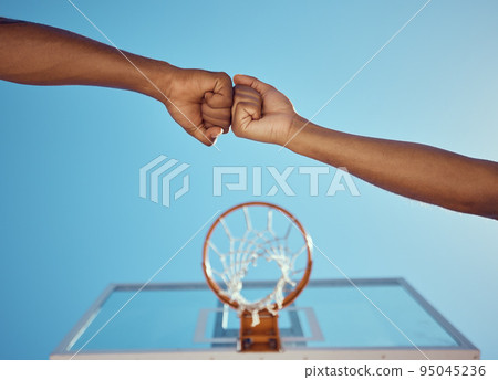Hands of basketball friends or team fist bump at game training and practice match at basketball court. Competitive athlete people in unity, solidarity and union play together sports hobby for fitness 95045236
