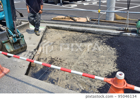 Pavement work on a sidewalk Pavement work on a sidewalk 95046134