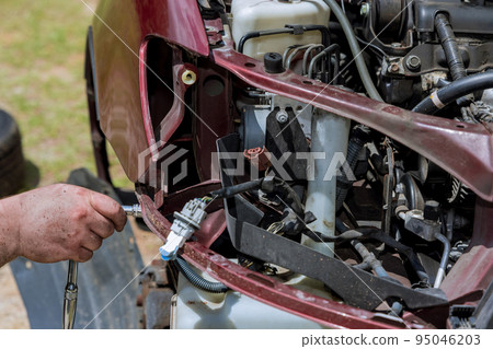 The result of damage sustained in a car accident may necessitate a new headlight being installed on the vehicle The result of damage sustained in a car accident may necessitate a new headlight being installed on the vehicle 95046203
