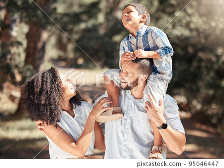 Love, relax and happy family laughing and bonding on outdoor walk in a park, cheerful and carefree. Playing, smiling and excited boy enjoying free time with his loving parents in nature on weekend 95046447