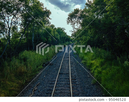 Empty rural railroad in wisconsin summer Empty rural railroad in wisconsin summer 95046528