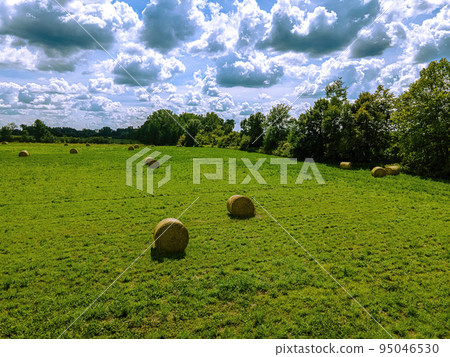Wisconsin summertime hay field Wisconsin summertime hay field 95046530