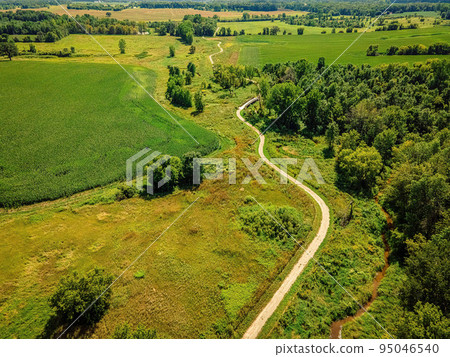 Aerial over wisconsin summer walking trail 95046540