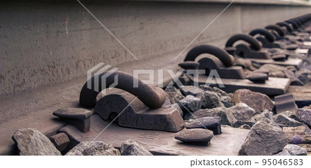 Rural train rails up-close in summer 95046583
