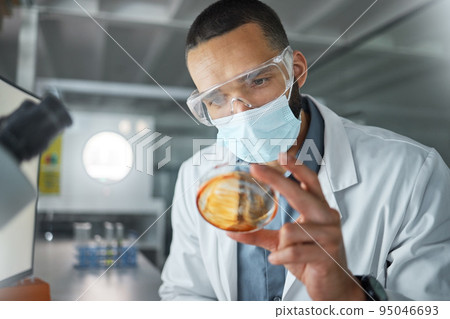 Laboratory scientist with covid virus petri dish to test, check and examine for healthcare, development or medicine innovation. Research, analysis and expert medical doctor study covid 19 bacteria Laboratory scientist with covid virus petri dish to test, check and examine for healthcare, development or medicine innovation. Research, analysis and expert medical doctor study covid 19 bacteria 95046693