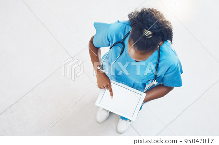 Doctor, tablet and healthcare website with blank mockup screen while standing and working in a hospital from above. Medical insurance app, nurse and 5g network for innovation in health and medicine 95047017