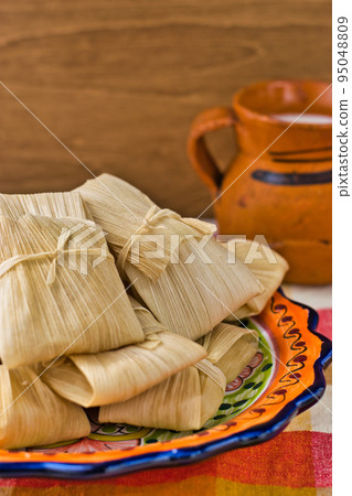Mexican cuisine tamales and atole Mexican cuisine tamales and atole 95048809