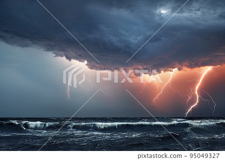 Large storm with thunderstorm lightning over sea. Dramatic stormy sky with thunderbolt extreme weather and broken water ocean. Natural disaster concept 95049327