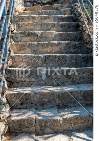 Stone staircase after renovation on the trail leading from St. George Monastery to Jasper Beach, Cape Fiolent, Crimea Russia. Famous 800 steps to the beach. The concept of healthy and active travel. 95049576
