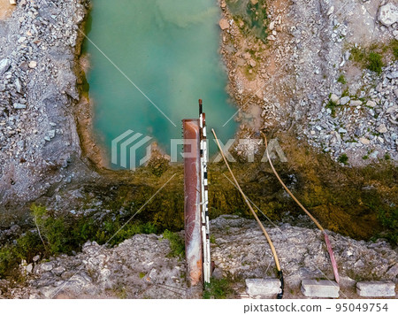 Old Platform over Rock Quarry Puddle Old Platform over Rock Quarry Puddle 95049754